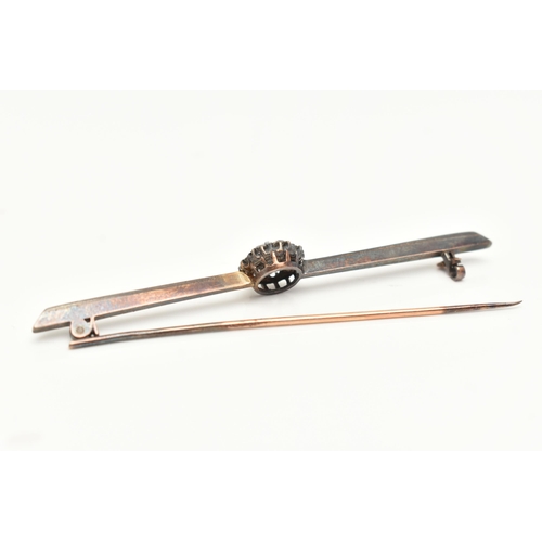 56 - A DIAMOND SET BAR BROOCH, discoloured bar, with a central circular cluster of seven old cut and roun... 