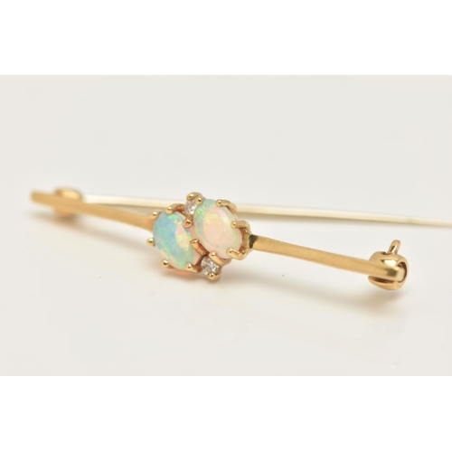 59 - AN 18CT GOLD OPAL AND DIAMOND BROOCH, set with two oval cut white opals, each in six claw settings, ... 