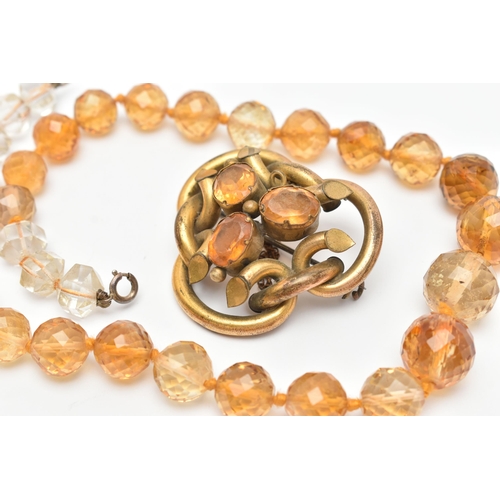 66 - TWO EARLY 20TH CENTURY JEWELLERY ITEMS, to include a faceted Citrine bead necklace, fitted with a wh... 