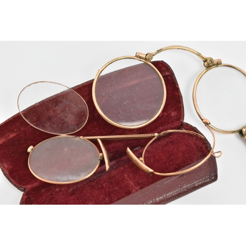 69 - A PAIR OF EARLY 20TH CENTURY LORGNETTES, rolled gold lorgnette with tortoise shell detail to the han... 