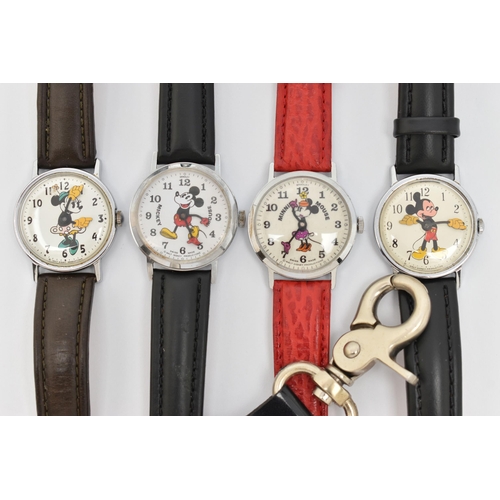 71 - FOUR WALT DISNEY WATCHES AND A CITROEN WATCH, including two Mickey Mouse wristwatches and two Minnie... 