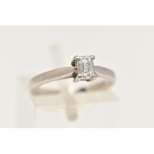 72 - A PLATINUM SINGLE DIAMOND RING, emerald cut diamond, measuring approximately 4.6mm x 3.4mm x 2.5mm, ... 