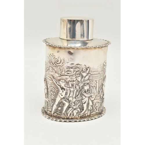 104 - A VICTORIA SILVER TEA CADDY, an oval form caddy, depicting a Grecian scene, with a crimped rim, hall... 