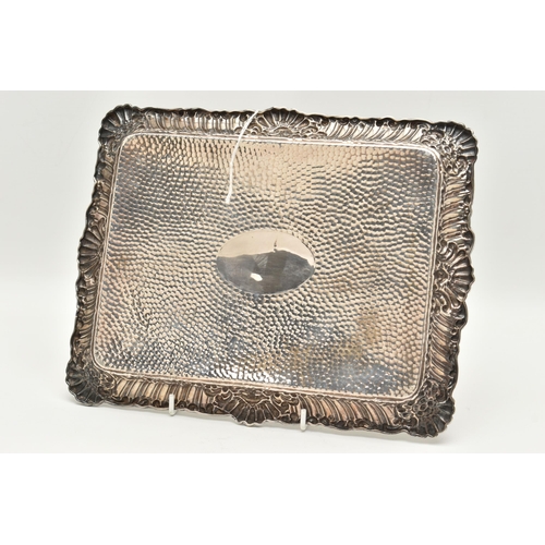 108 - AN EDWARD VI SILVER DRESSING TABLE TRAY, rectangular form tray with gadrooned detail, hammered base ... 