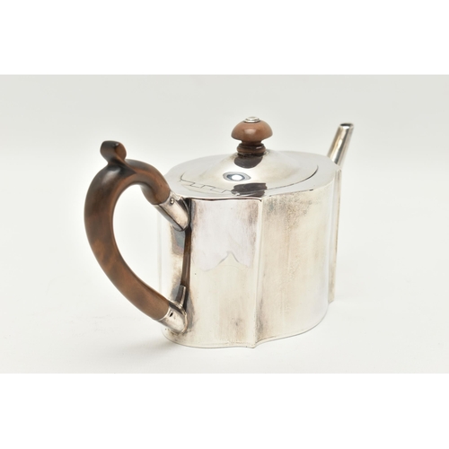 112 - AN EDWARDIAN SILVER TEAPOT, polished wavy outline, fitted with a light wooden handle and finial, hin... 