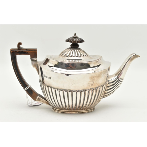 117 - A LATE VICTORIAN SILVER TEAPOT, stop reeded design, fitted with an ebonised handle and finial, maker... 