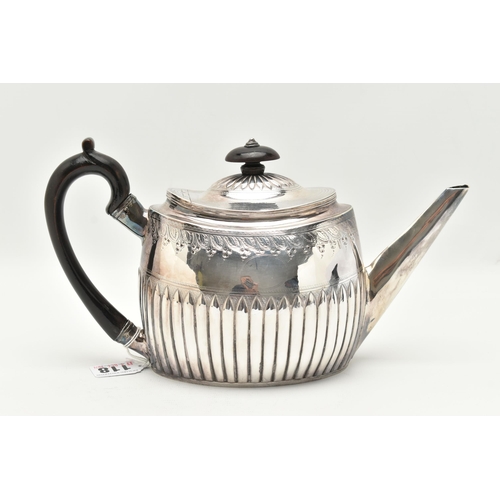 118 - A GEORGE III SILVER TEAPOT, stop reeded design with engraved foliate pattern, two vacant oval cartou... 