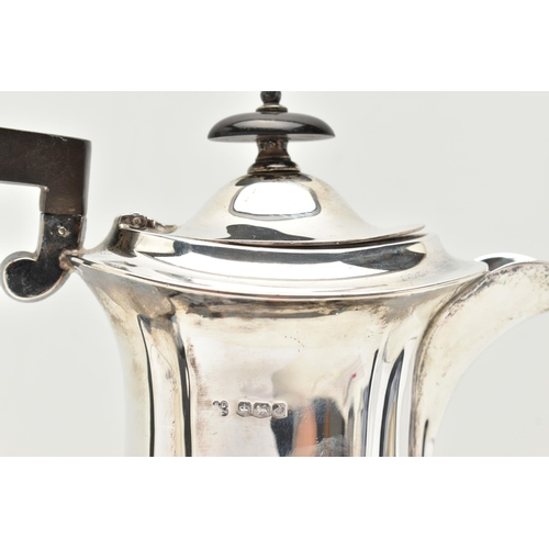 119 - A GEORGE V SILVER COFFEE POT, faceted polished design, fitted with an ebonised handle and finial, ra... 