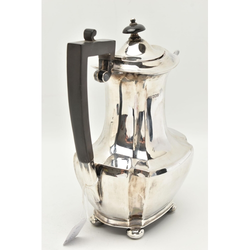 119 - A GEORGE V SILVER COFFEE POT, faceted polished design, fitted with an ebonised handle and finial, ra... 