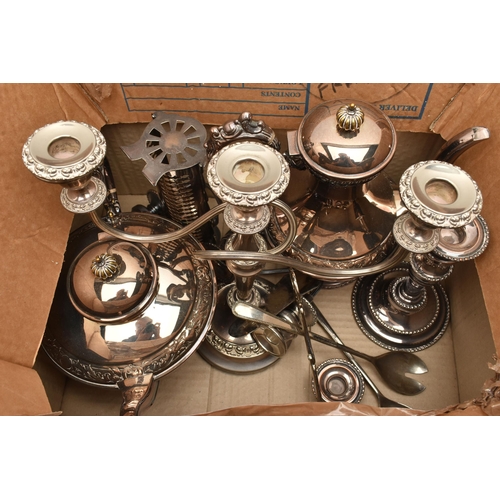 130 - TWO BOXES OF SILVER PLATED WARE, to include a hand chased EPC plated four piece tea service, a cande... 