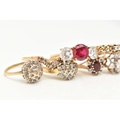 79 - AN ASSORTMENT OF GOLD AND YELLOW METAL RINGS, to include a 14ct gold cubic zirconia and synthetic ru... 