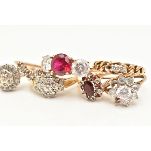 79 - AN ASSORTMENT OF GOLD AND YELLOW METAL RINGS, to include a 14ct gold cubic zirconia and synthetic ru... 