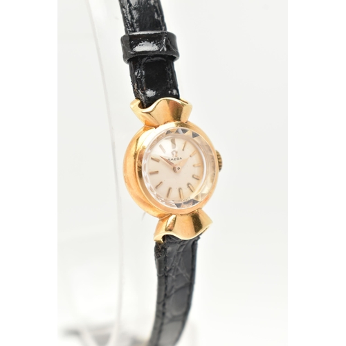 88 - A LADIES OMEGA WRISTWATCH, hand wound movement, round dial signed 'Omega', baton markers, yellow gol... 