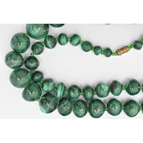 89 - TWO GEMSTONE BEADED NECKLACES, the first a malachite necklace, designed as graduated beads, fitted w... 