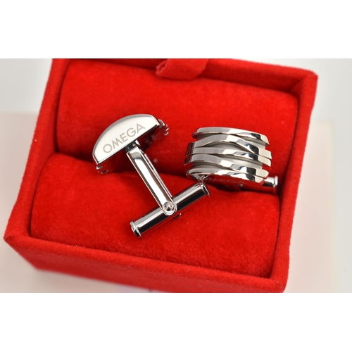 165 - TWO PAIRS OF OMEGA CUFFLINKS, each designed as a rectangular shape panel with plain polished undulat... 