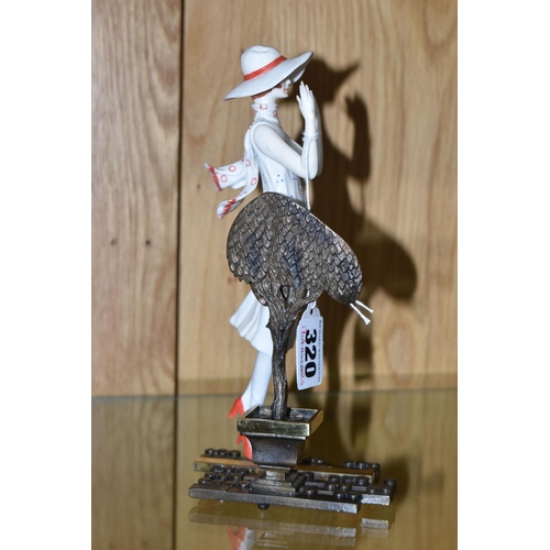 320 - AN ALBANY FINE CHINA ART DECO STYLE FIGURINE, titled Chelsea stood before a bronzed metal stylised t... 