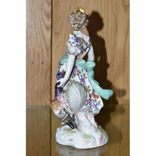 321 - A NINETEENTH CENTURY CONTINENTAL PORCELAIN FIGURE, depicting Juno with Peacock and a lizard climbing... 