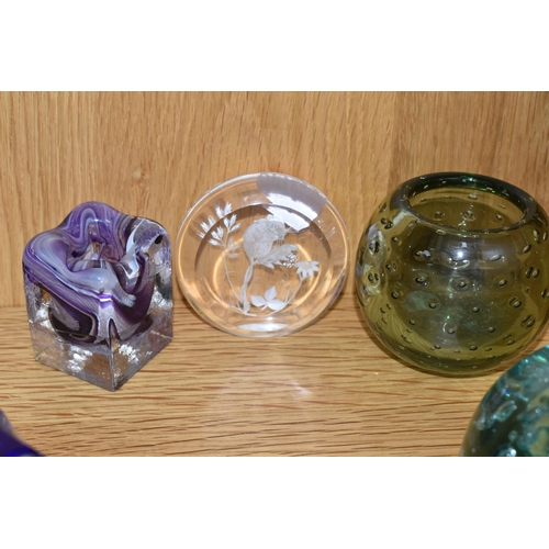 325 - A COLLECTION OF COLOURED GLASS AND PAPERWEIGHTS, comprising a green 'Dump Glass' paperweight, a Cait... 