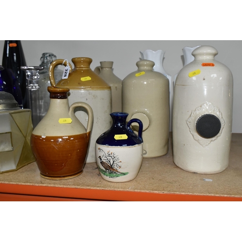 328 - A SELECTION OF TALL ITEMS CERAMICS AND GLASS, to include a matching pair of glass candlesticks with ... 