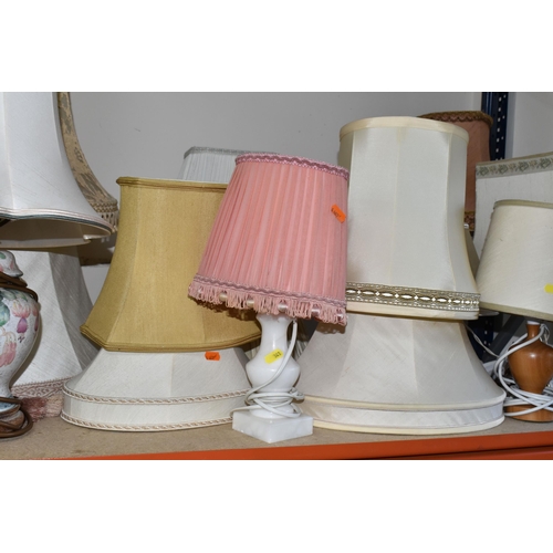 341 - A LARGE QUANTITY OF TABLE LAMPS AND LIGHT SHADES, comprising a pair of turned wood bedside lamps, a ... 