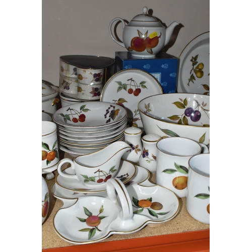 343 - A LARGE QUANTITY OF ROYAL WORCESTER 'EVESHAM' PATTERN DINNERWARE, comprising four covered casserole ... 