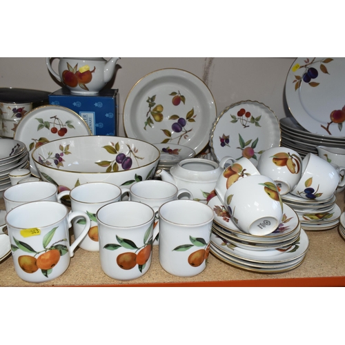 343 - A LARGE QUANTITY OF ROYAL WORCESTER 'EVESHAM' PATTERN DINNERWARE, comprising four covered casserole ... 