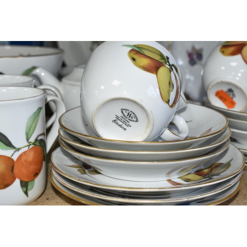 343 - A LARGE QUANTITY OF ROYAL WORCESTER 'EVESHAM' PATTERN DINNERWARE, comprising four covered casserole ... 