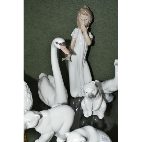 352 - A GROUP OF LLADRO AND NAO FIGURES, comprising Lladro: Swan with wings spread, no 5231, issued 1984-2... 