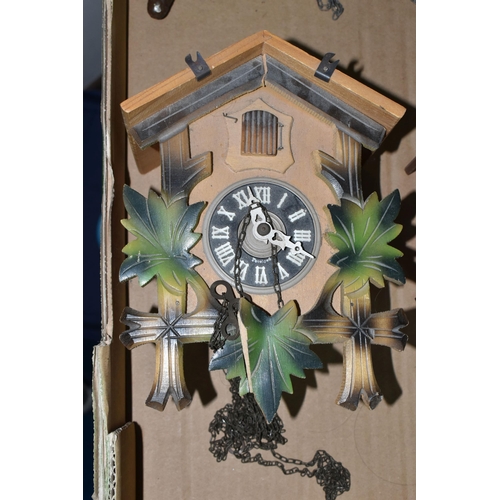 370 - ONE BOX CONTAINING THREE CUCKOO CLOCKS, comprising a brown Bakelite Russian made cuckoo clock made b... 