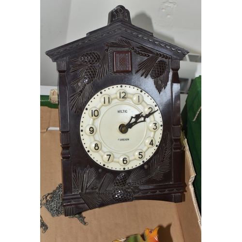 370 - ONE BOX CONTAINING THREE CUCKOO CLOCKS, comprising a brown Bakelite Russian made cuckoo clock made b... 