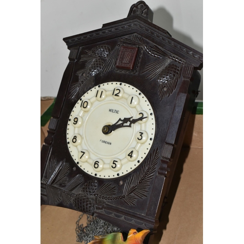 370 - ONE BOX CONTAINING THREE CUCKOO CLOCKS, comprising a brown Bakelite Russian made cuckoo clock made b... 