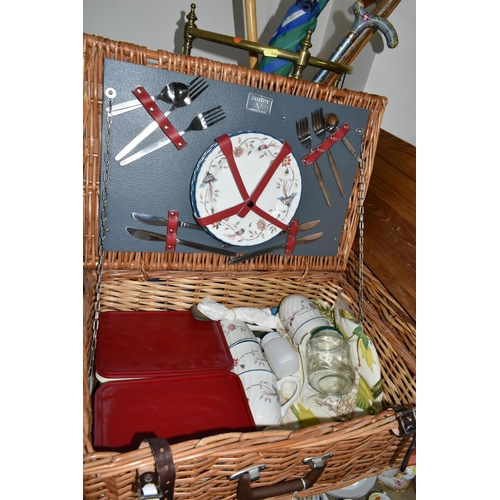 374 - A GROUP OF SUITCASES AND WICKER ANTLER PICNIC HAMPER, comprising an Antler picnic hamper with settin... 