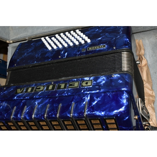 394 - A DELICIA JUNIOR II PIANO ACCORDION, Royal Blue Lacquered Finish with travelling case