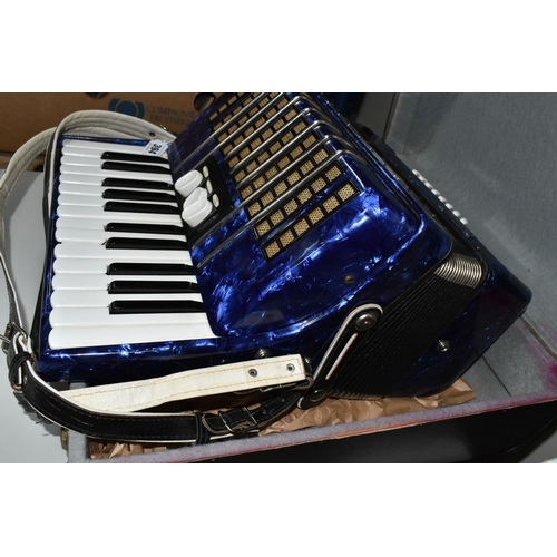 394 - A DELICIA JUNIOR II PIANO ACCORDION, Royal Blue Lacquered Finish with travelling case