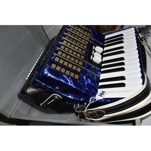 394 - A DELICIA JUNIOR II PIANO ACCORDION, Royal Blue Lacquered Finish with travelling case