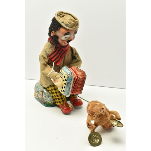 403 - AN ALPS (JAPAN) TINPLATE CLOCKWORK ACCORDION PLAYING CLOWN WITH CYMBAL PLAYING MONKEY, not tested, s... 