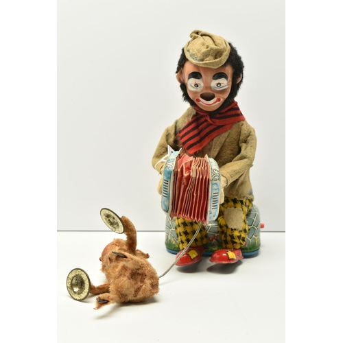 403 - AN ALPS (JAPAN) TINPLATE CLOCKWORK ACCORDION PLAYING CLOWN WITH CYMBAL PLAYING MONKEY, not tested, s... 