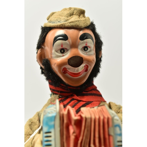 403 - AN ALPS (JAPAN) TINPLATE CLOCKWORK ACCORDION PLAYING CLOWN WITH CYMBAL PLAYING MONKEY, not tested, s... 