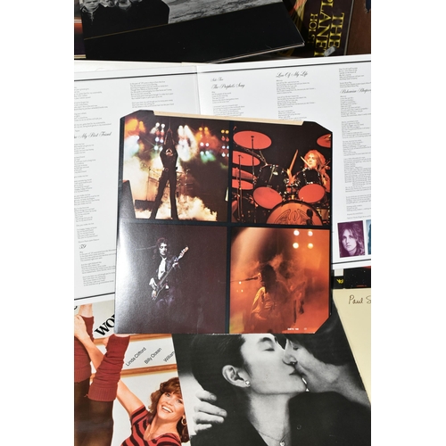 406 - A BOX OF RECORDS, approximately fifty 12'' singles and LPs to include Queen A Night at the Opera EMT... 