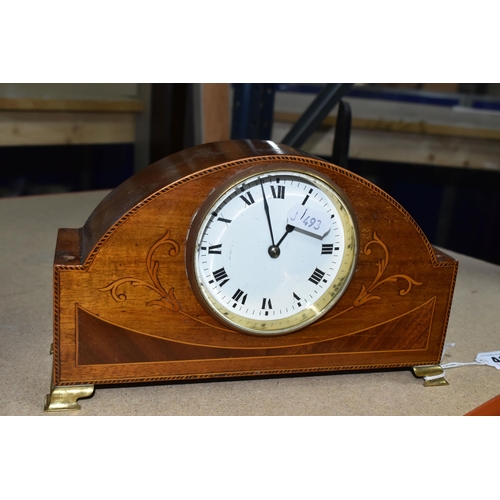 410 - TWO WOODEN CASED MANTEL CLOCKS, one of arched form, with white enamel dial marked with black Arabic ... 