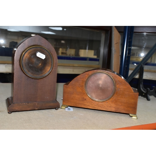 410 - TWO WOODEN CASED MANTEL CLOCKS, one of arched form, with white enamel dial marked with black Arabic ... 