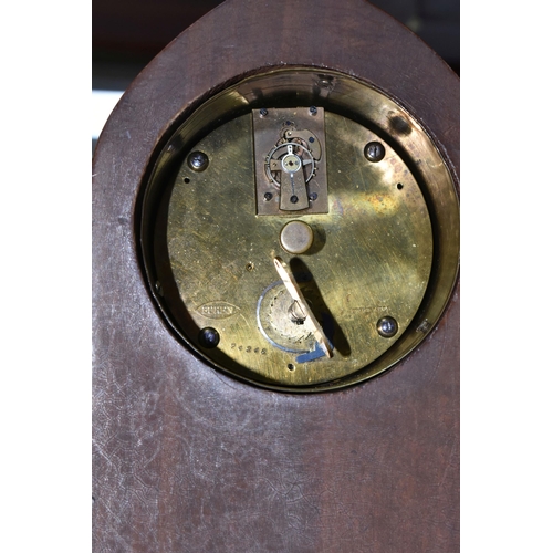 410 - TWO WOODEN CASED MANTEL CLOCKS, one of arched form, with white enamel dial marked with black Arabic ... 