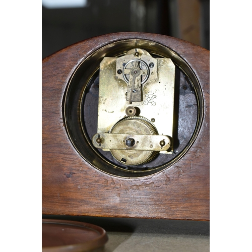 410 - TWO WOODEN CASED MANTEL CLOCKS, one of arched form, with white enamel dial marked with black Arabic ... 