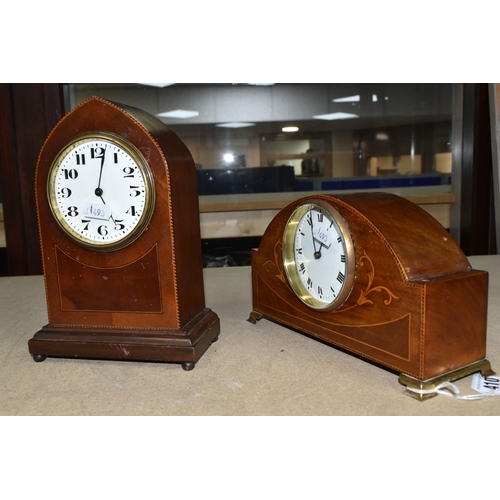 410 - TWO WOODEN CASED MANTEL CLOCKS, one of arched form, with white enamel dial marked with black Arabic ... 