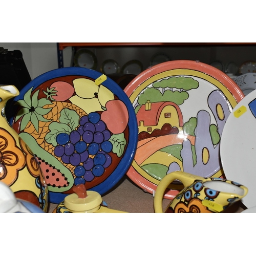 458 - A LARGE GROUP OF HANDPAINTED POTTERY, most pieces are stamped on the bottom with the signature Ellie... 