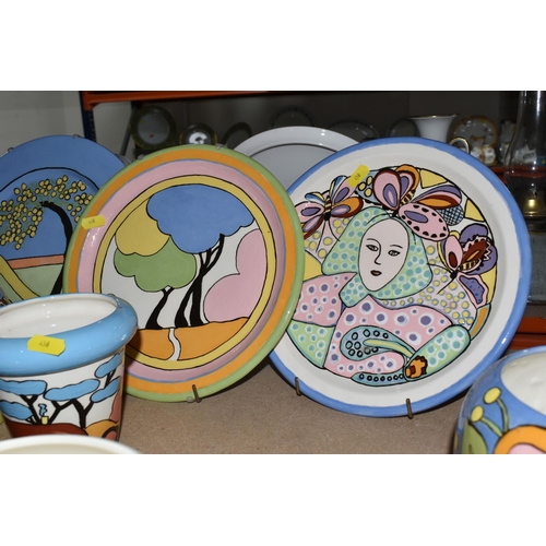 458 - A LARGE GROUP OF HANDPAINTED POTTERY, most pieces are stamped on the bottom with the signature Ellie... 