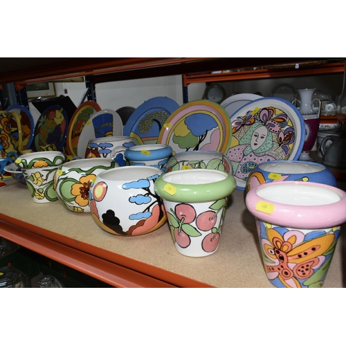 458 - A LARGE GROUP OF HANDPAINTED POTTERY, most pieces are stamped on the bottom with the signature Ellie... 