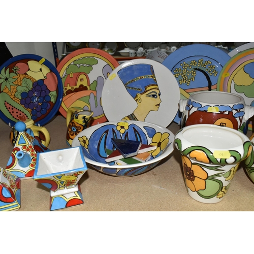 458 - A LARGE GROUP OF HANDPAINTED POTTERY, most pieces are stamped on the bottom with the signature Ellie... 