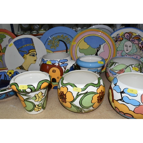 458 - A LARGE GROUP OF HANDPAINTED POTTERY, most pieces are stamped on the bottom with the signature Ellie... 