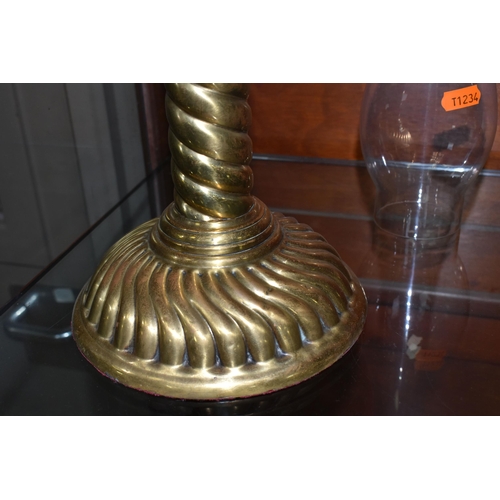 485 - A CUT GLASS AND BRASS OIL LAMP, with cut glass reservoir, brass twist column and base, etched shade ... 